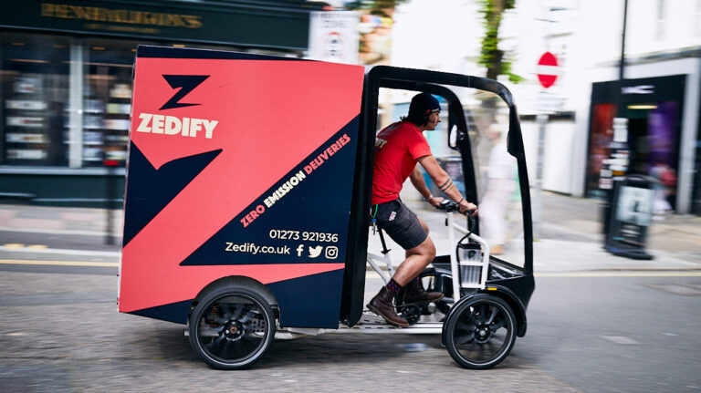 Courier on a Zedify cargo bike.