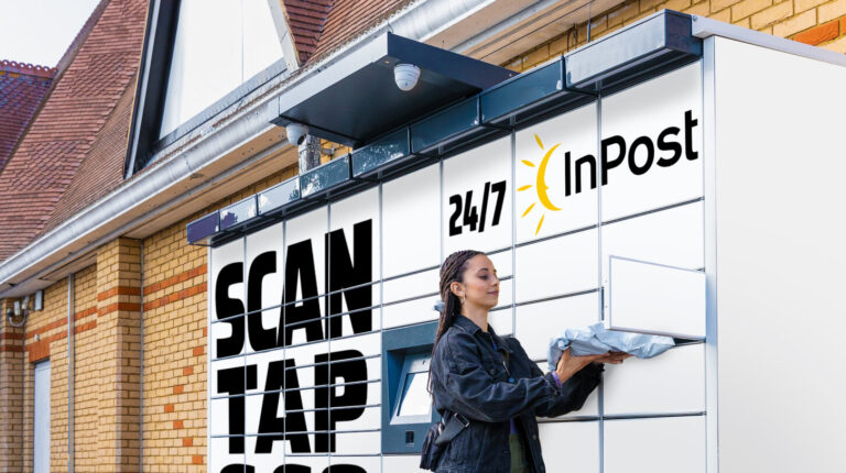 Woman using one of InPost's lockers to post a parcel