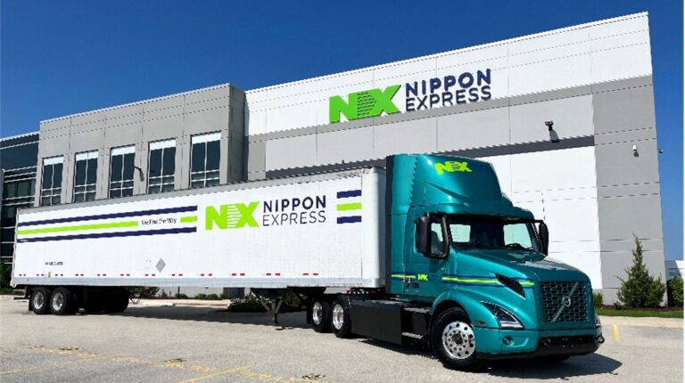 One of the new electric trucks outside Nippon facility