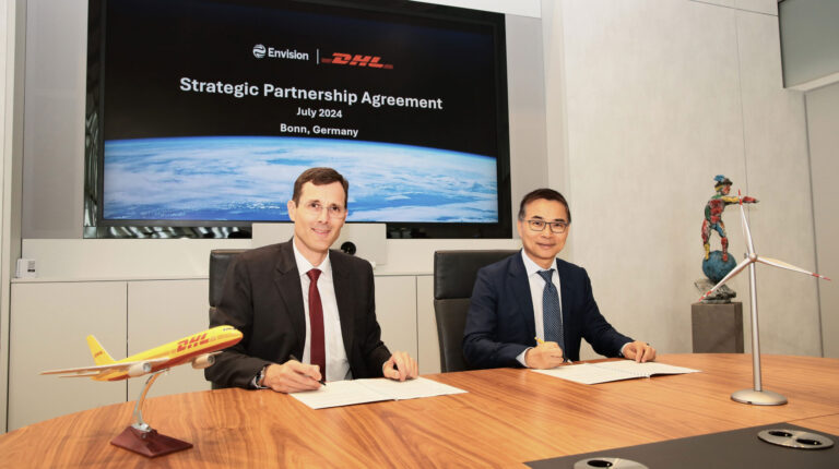 L-R: Tobias Meyer, chief executive officer at DHL Group, and Zhang Lei, chairman of Envision Group