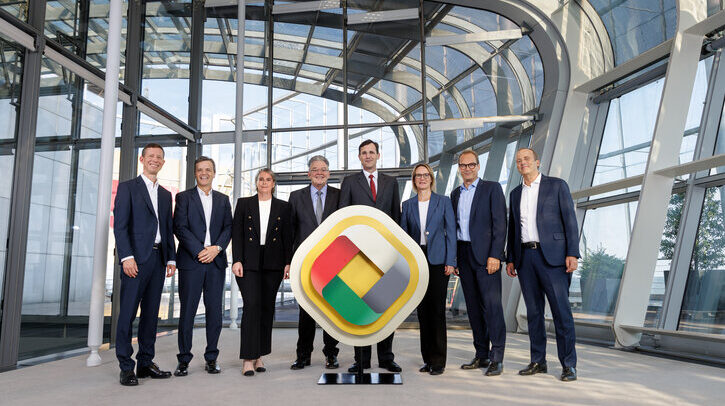 DHL Group management board with new 2030 strategy logo.