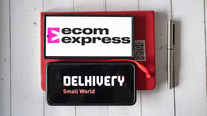 Delhi, India - 5th Apr 2025: Mobile phone showing the app screen for ecommerce logistics startup ecom express which was acquired by Delhivery showing business setting with diary and pen