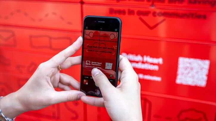 Royal Mail launch of a new bank of parcel lockers featuring the BHF Qr code to learn CPR.