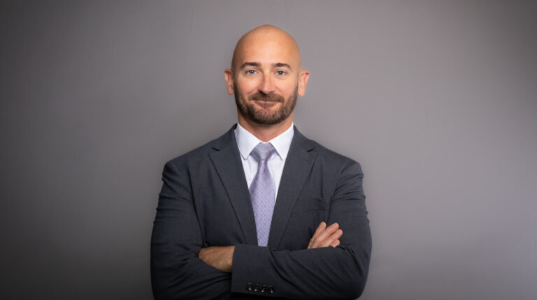 Scott Ashbaugh profile photo, with a grey background.