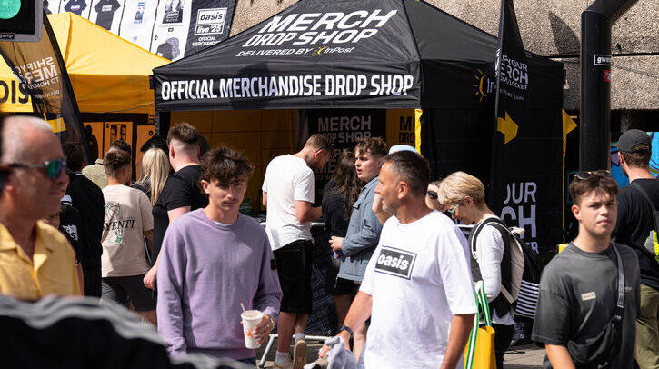 Oasis fans outside an official merchandise shop on the Live '25 tour.