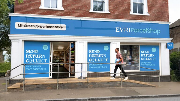 A customer walks up a ramp to the entrance of an Evri ParcelShop